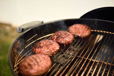 Close-up of meat on barbecue grill