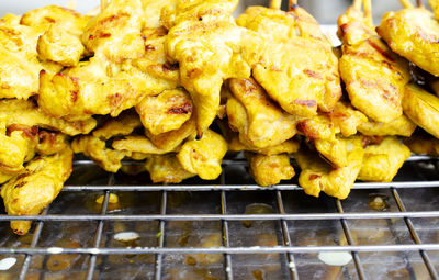 High angle view of meat on barbecue grill