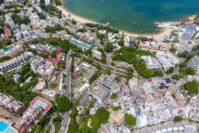 High angle view of street amidst buildings in town