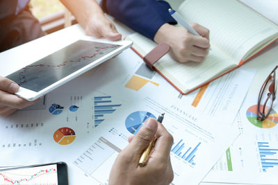 Low angle view of man working on table