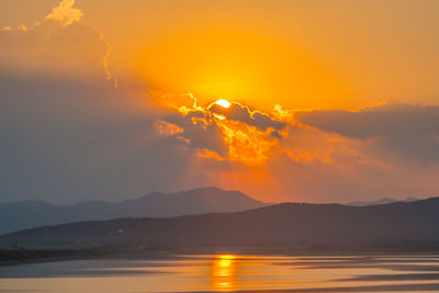 Scenic view of mountains against sky during sunset