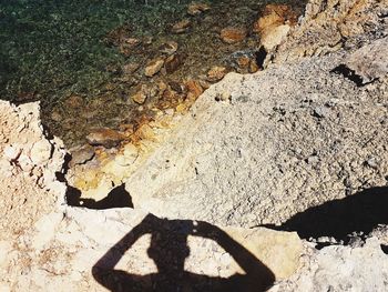 High angle view of shadow on sand