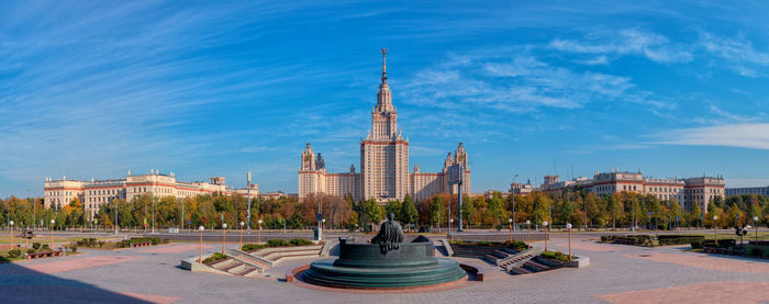 Buildings in city against sky