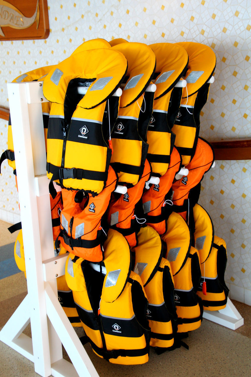 STACK OF YELLOW CHAIRS IN ROW