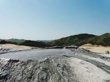 Scenic view of land against clear sky