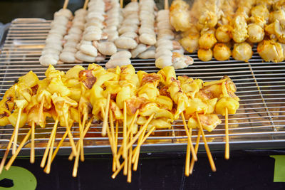 Grill skewer squid at street market