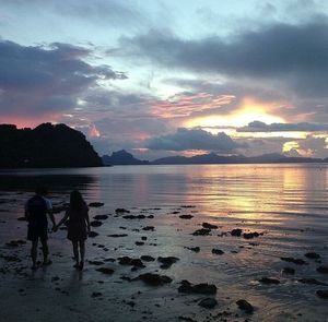 Scenic view of sea at sunset