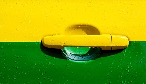 Close-up of wet car door