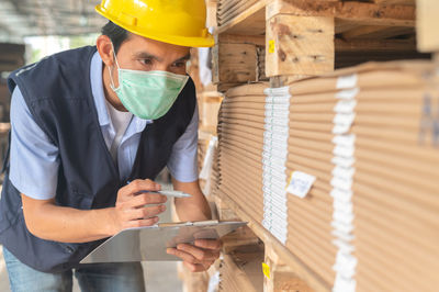 Young man working in workshop