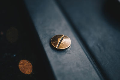 High angle view of coins on table
