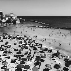 High angle view of people on beach against sky