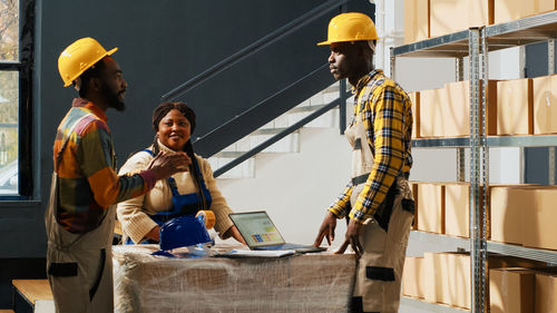 Side view of man working in workshop