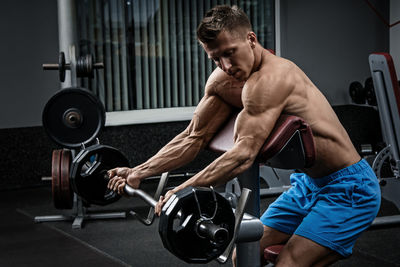 Man exercising in gym