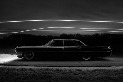 Cadillac sedan deville at night