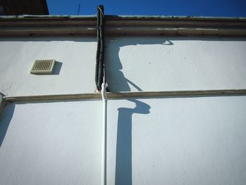 Low angle view of building against blue sky