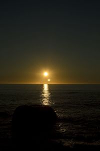 Scenic view of sea at sunset