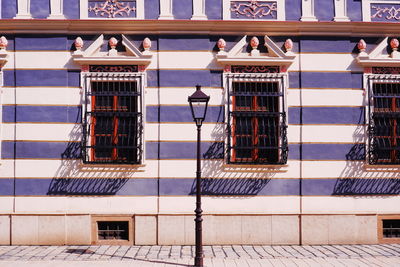 Low angle view of building seen through window