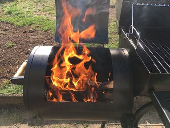 Close-up of fire on barbecue grill