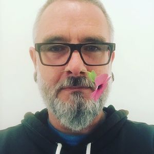 Portrait of man wearing eyeglasses