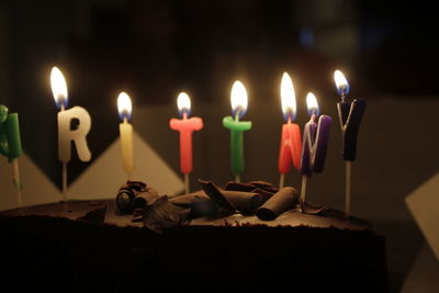 Close-up of candles on birthday cake