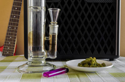 Close-up of glass bottles on table