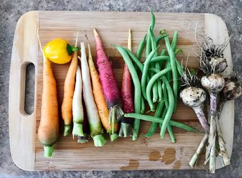 High angle view of vegetables on cutting board