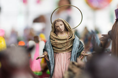 Close-up of virgin mary figurine