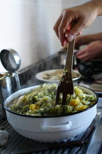 Midsection of person preparing food on table