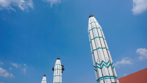 Low angle view of building against blue sky