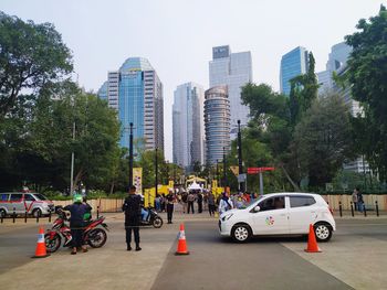 View of city buildings against sky