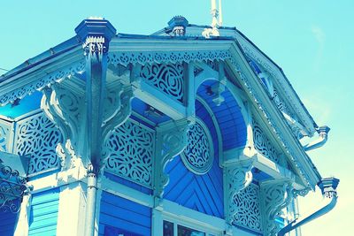 Low angle view of sculpture against clear blue sky