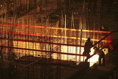 People working at sunset