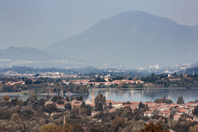 Aerial view of cityscape against sky at night