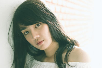 Close-up portrait of young woman
