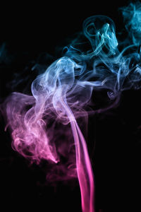 Close-up of smoke against black background