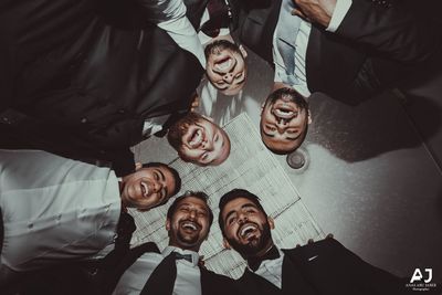 High angle view of people standing at home