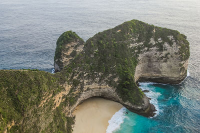 High angle view of rock formation in sea