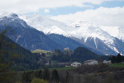 Scenic view of snowcapped mountains against sky