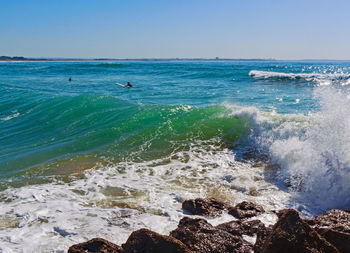 Scenic view of sea against clear sky