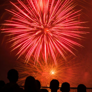 Firework display at night