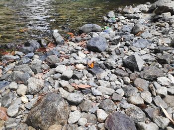 High angle view of stones on beach