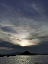 Scenic view of sea against sky at sunset