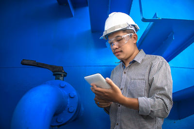 Young man using mobile phone