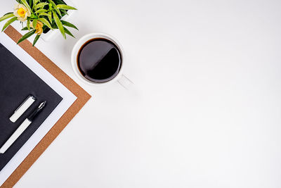 High angle view of coffee cup on table