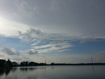 Scenic view of sea against cloudy sky