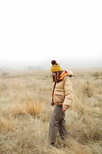 Full length of person standing on field