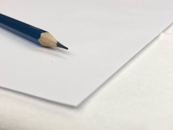 High angle view of pencils on white background