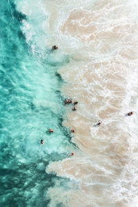 High angle view of man surfing in sea