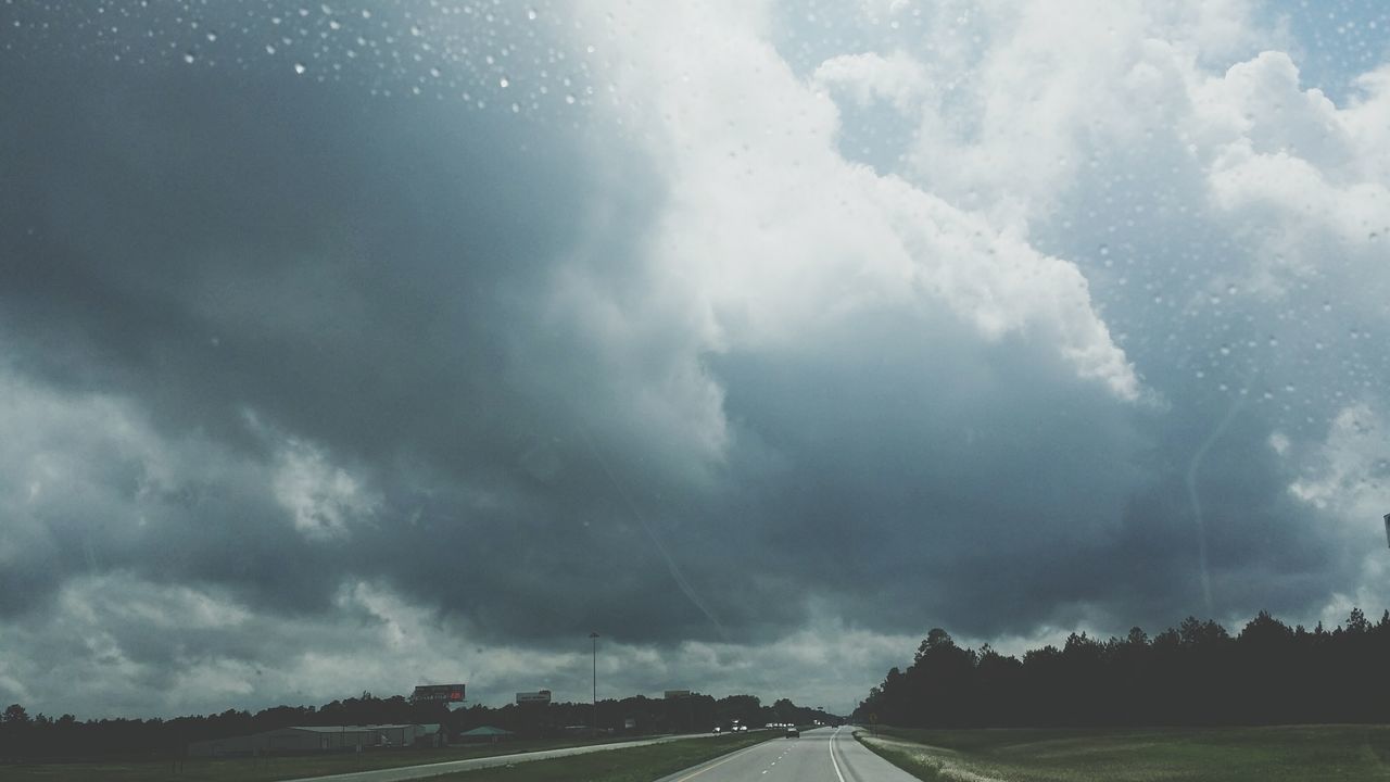 sky, cloud - sky, road, cloudy, the way forward, transportation, nature, beauty in nature, scenics, tranquility, weather, diminishing perspective, tranquil scene, cloud, vanishing point, landscape, storm cloud, overcast, dramatic sky, country road