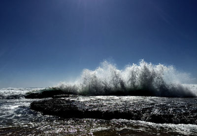 Scenic view of calm sea against sky